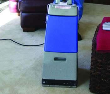 vaccuming  gray carpet